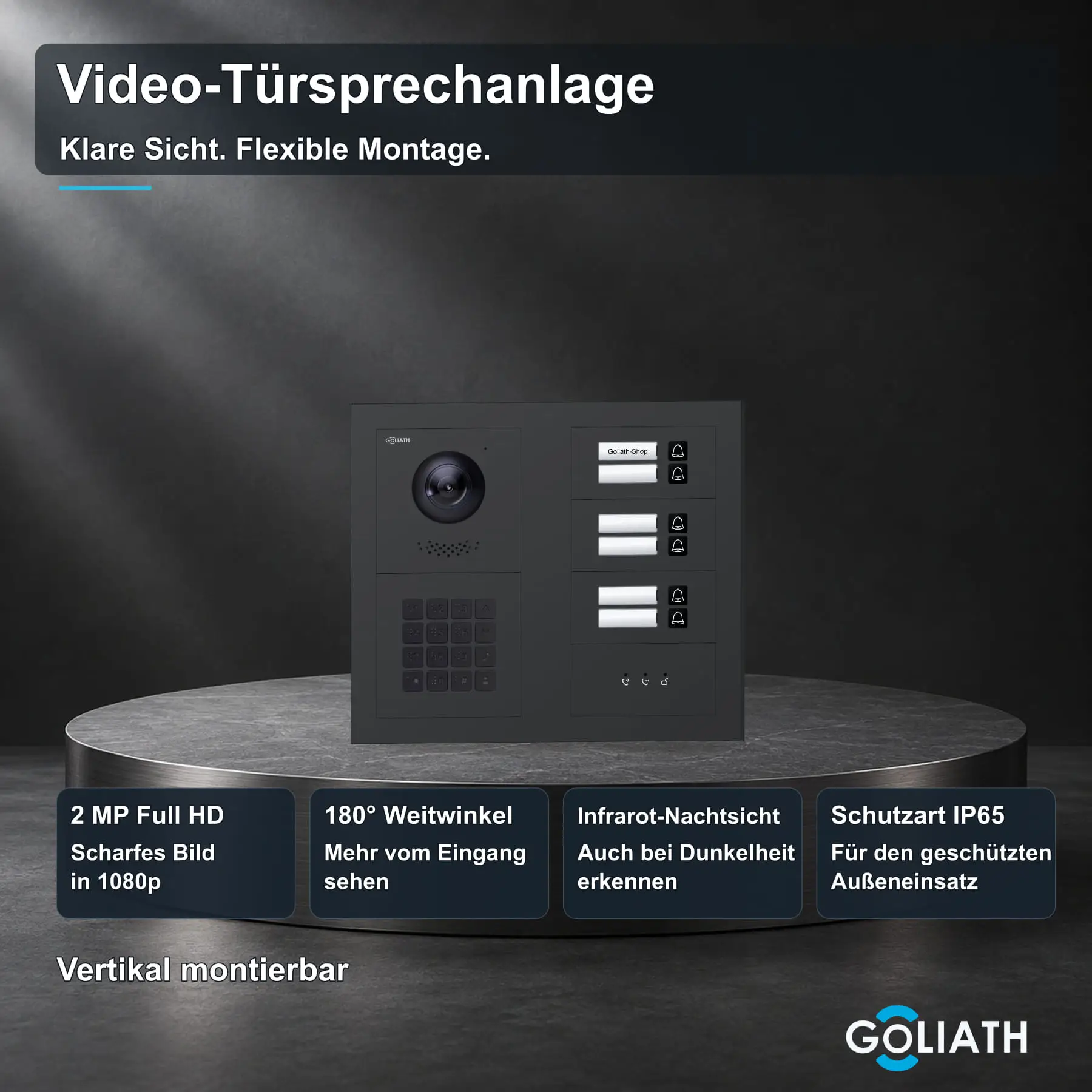 Goliath Premium-Line-Außenstation in Anthrazit mit Kamera, 6 Klingeltasten, Zahlencode-Tastatur und Feedback-Anzeige. Zwei aufrechte Modulspalten nebeneinander auf Naturstein.